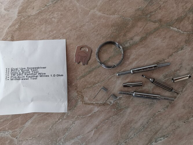 Innokin Ares Finale - Paper Bag Contents (tools, coils)