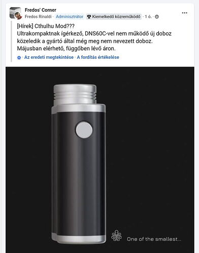 The image shows a sleek, round device with a silver border, standing on a black base, featuring a button, and is presumably a new, ultra-compact mod. (Captioned by AI)