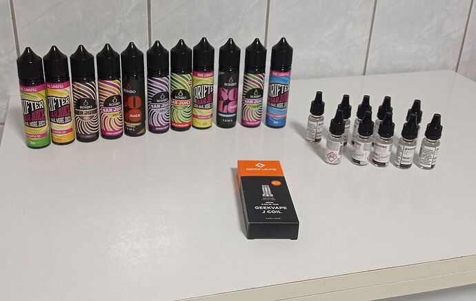 Various flavored vape liquids and spare parts can be found on the table. (Subtitled with AI)