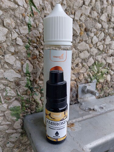 A woman stands on the beach, her back to the camera, watching the sunset while the wind blows her hair and her long dress. (AI-generated caption)