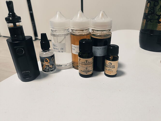 Various e-liquid ingredients and a black electronic cigarette are found on the table. (Subtitled by AI)