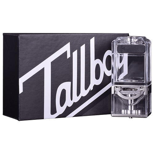 A clear Tallboy brand device next to a black box with Tallboy written in white lettering. (Labeled by AI)